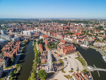High angle view of buildings against clear sky