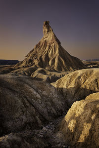 Scenic view of rock formation against clear sky