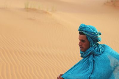 Portrait of man in desert