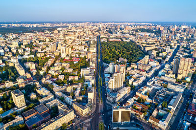 High angle view of city buildings against sky