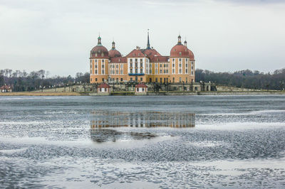 View of building against cloudy sky