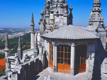 Exterior of temple against sky in city