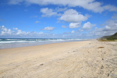 Scenic view of beach against sky