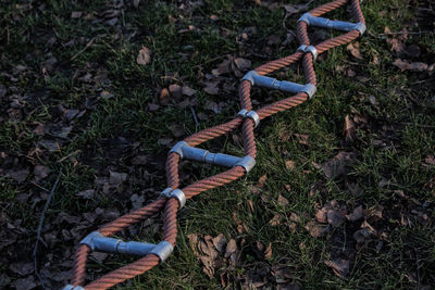 High angle view of rope on field