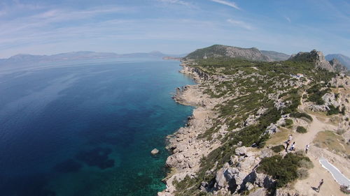 Aerial view of mountain by sea against sky at loutraki