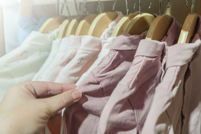Close-up of hands for sale in store
