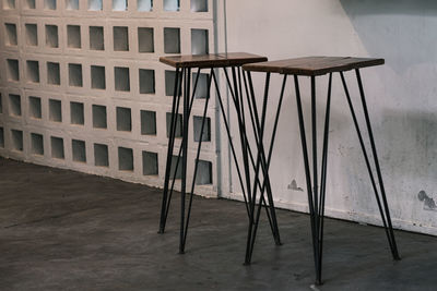 High angle view of chairs on table