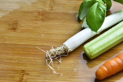 High angle view of vegetables on cutting board