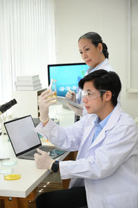 Side view of doctor working at clinic