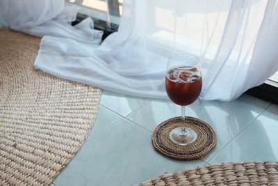 Close-up of wine glass on table