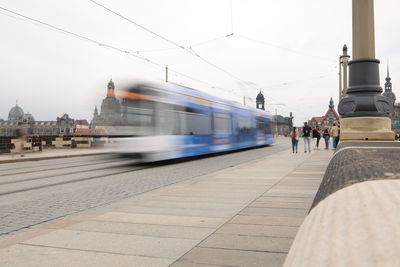 Blurred motion of train at railroad station