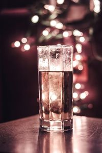 Close-up of wine in glass on table