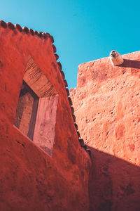 Low angle view of fort against blue sky