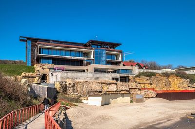 Illegal building at the very edge of the black sea on the wild beach in odessa, ukraine