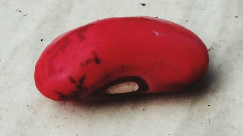 Close-up of red bread on table