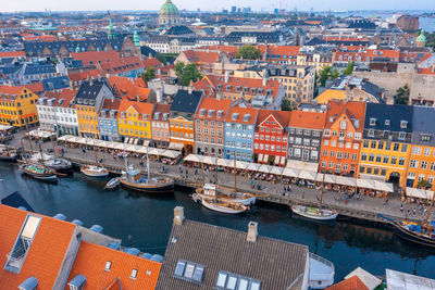 Famous nyhavn pier with colorful buildings and boats in copenhagen, denmark.