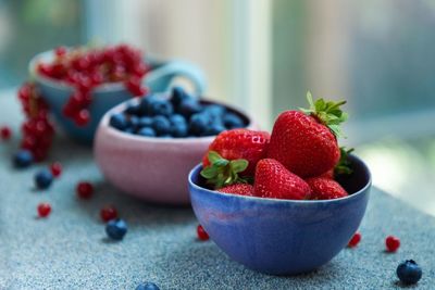 Close-up of strawberries in bowl on table