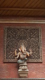 Low angle view of buddha statue