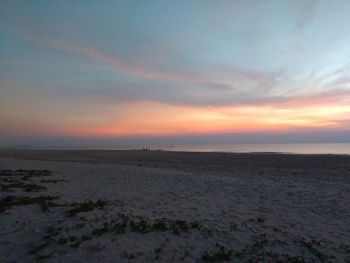 Scenic view of sea at sunset