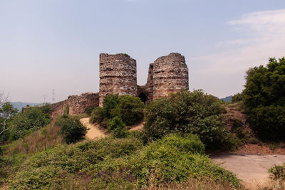 Historic fort by trees against sky