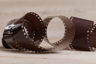 Close-up of film reel on table