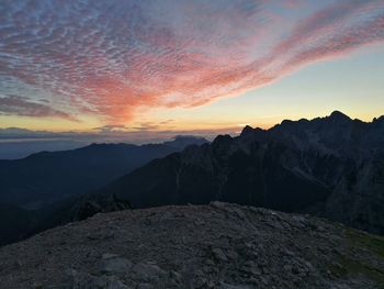 Scenic view of mountains against sky during sunset