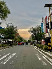 Road in city against sky