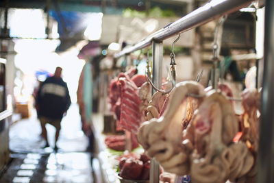 Meat hanging for sale in market