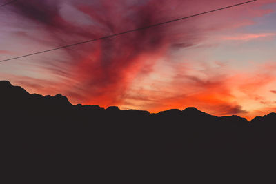 Low angle view of dramatic sky during sunset