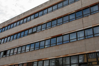 Low angle view of modern building against sky