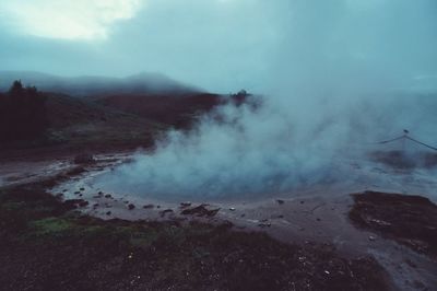 Steam emerging fro geyser