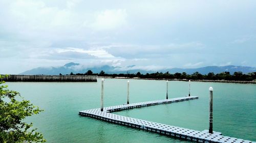 High angle view of built structure in water against sky