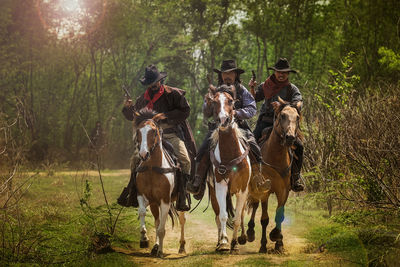 Panoramic shot of people riding bicycles