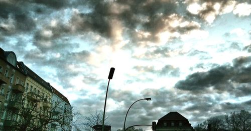 Low angle view of street light against sky