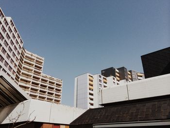 Low angle view of skyscraper against clear sky