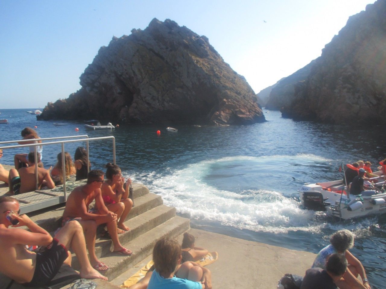 PEOPLE AT BEACH AGAINST SKY