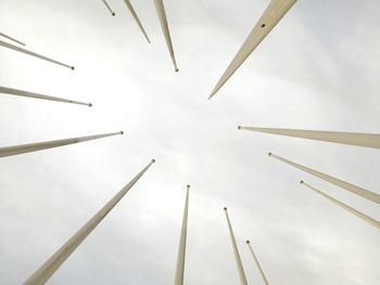 Low angle view of helicopter flying against sky