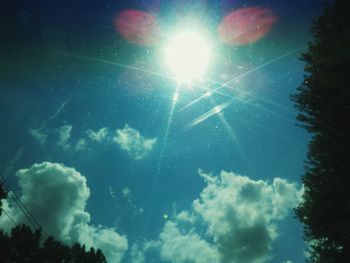 Low angle view of blue sky and clouds