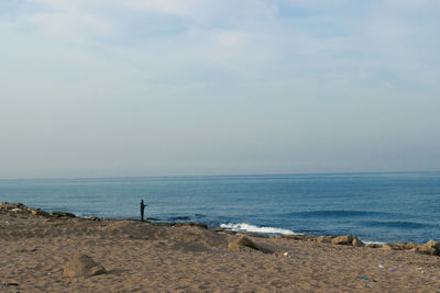 Scenic view of sea against blue sky