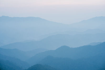 Wide view layer of mountain with sunrise background