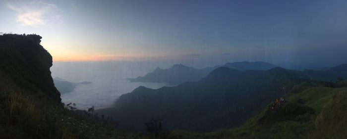 Scenic view of mountains against sky during sunset