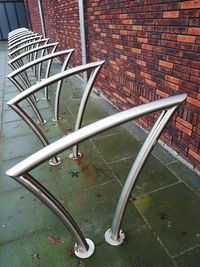 Chairs and table against brick wall