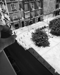 Person standing in front of building