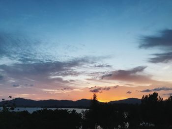 Scenic view of silhouette landscape against sky during sunset