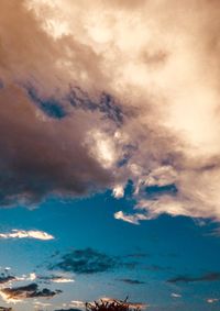 Low angle view of clouds in sky during sunset