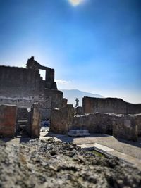 Old ruin building against blue sky