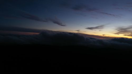 Low angle view of dramatic sky during sunset