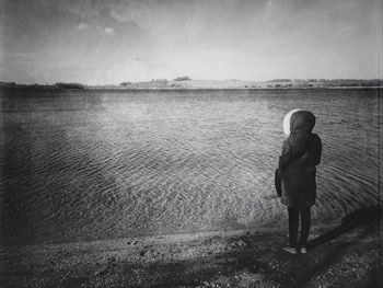 Woman standing on grass