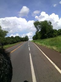 Empty road passing through landscape