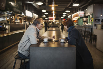 People standing in restaurant